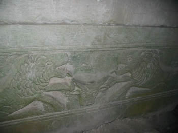 Lions devouring a cow on sarcophagus 